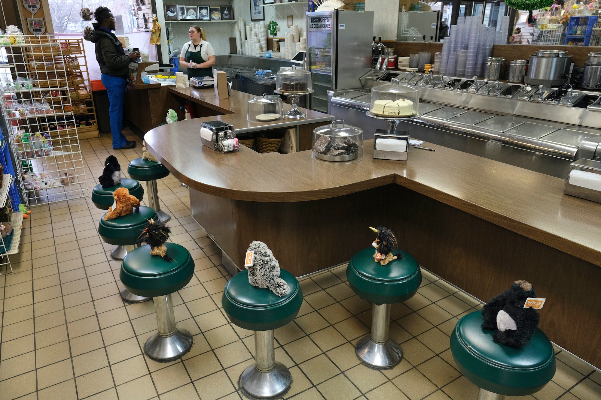 Stuffed animals on the stools in Bischoff's, an ice cream parlor