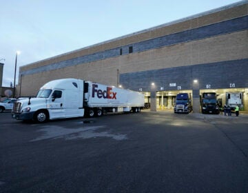 Boxes containing the Pfizer-BioNTech COVID-19 vaccine are prepared to be shipped at the Pfizer Global Supply Kalamazoo manufacturing plant in Portage