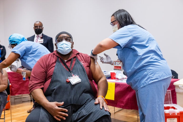 Temple Health System employees receive COVID-19 vaccinations on Dec. 16, 2020. (Photo by Daniel Burke)