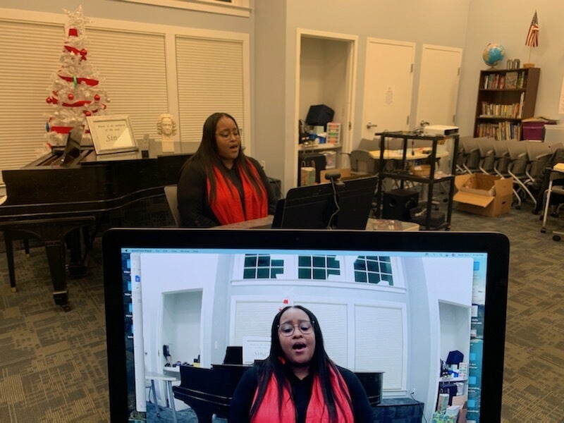 Alto Trisha Melton, one of the Choir School of Delaware's singing mentors, takes part in a recent rehearsal session via video conference. 