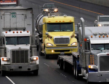 Trucks are pictured on a highway in this file photo.