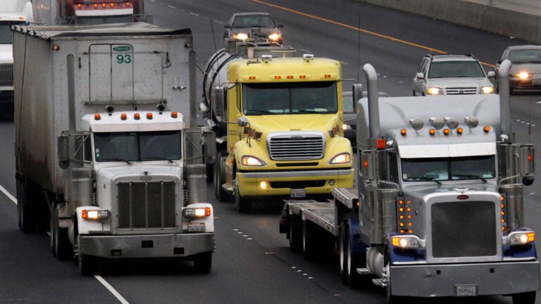 Trucks are pictured on a highway in this file photo.