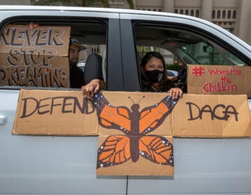 People are pictured demonstrating in June in favor of the Deferred Action for Childhood Arrivals program. Immigrant rights advocates hailed Friday's ruling allowing new applications as a 