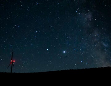 Saturn (center, left) and Jupiter (center, right) share a night sky earlier this year near Vantage, Wash. Already this past summer, the two planets were growing closer in the night sky. (Ted S. Warren/AP)