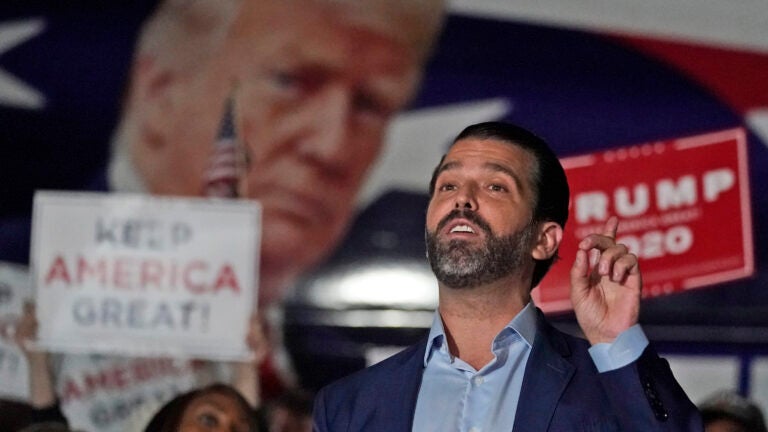 President Trump is being urged to pardon some of those closest to him preemptively, including son Donald Trump Jr. (John Bazemore/AP)