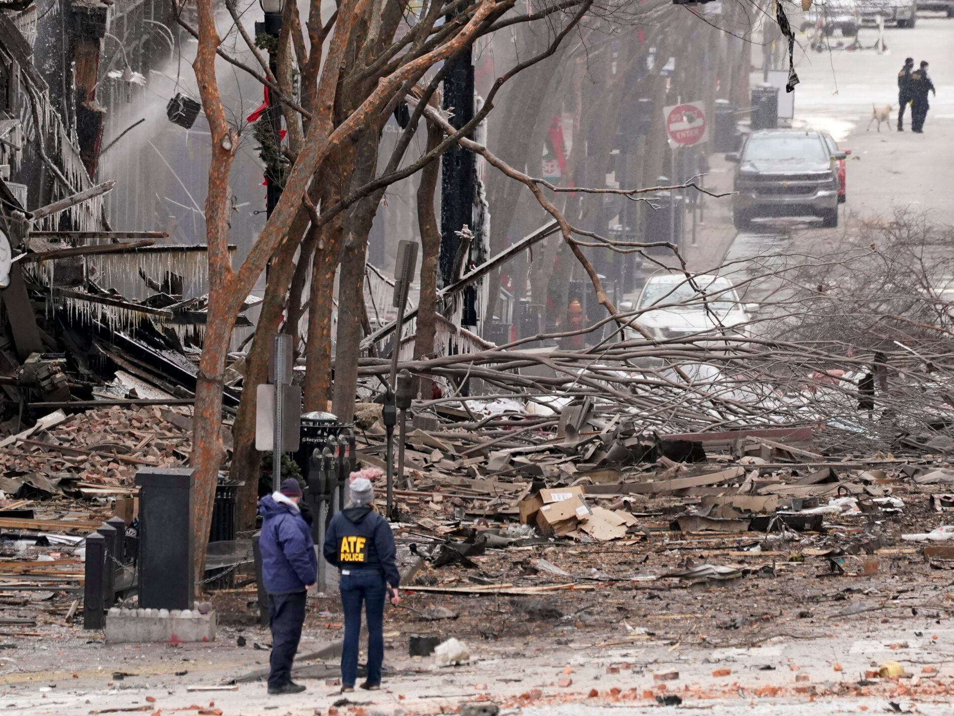 Emergency personnel work near the scene of an explosion in downtown Nashville