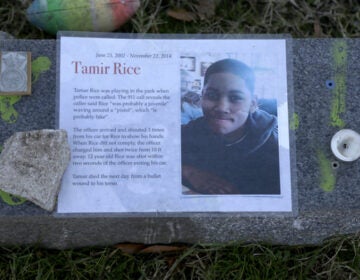 The Justice Department announced Tuesday that it would not bring federal criminal charges against two Cleveland police officers in the 2014 killing of 12-year-old Tamir Rice (pictured in a memorial). Officials said video of the shooting was of too poor a quality for prosecutors to conclusively establish what had happened. (Jacqueline Larma /AP Photo)