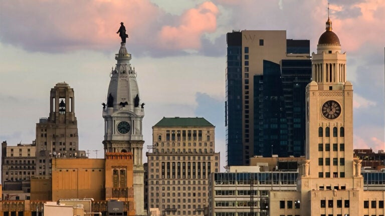 Philadelphia City Hall is visible in a view of the Philadelphia skyline.