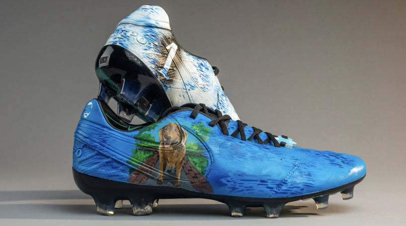 Customized cleats for Cam Johnston feature the PSPCA