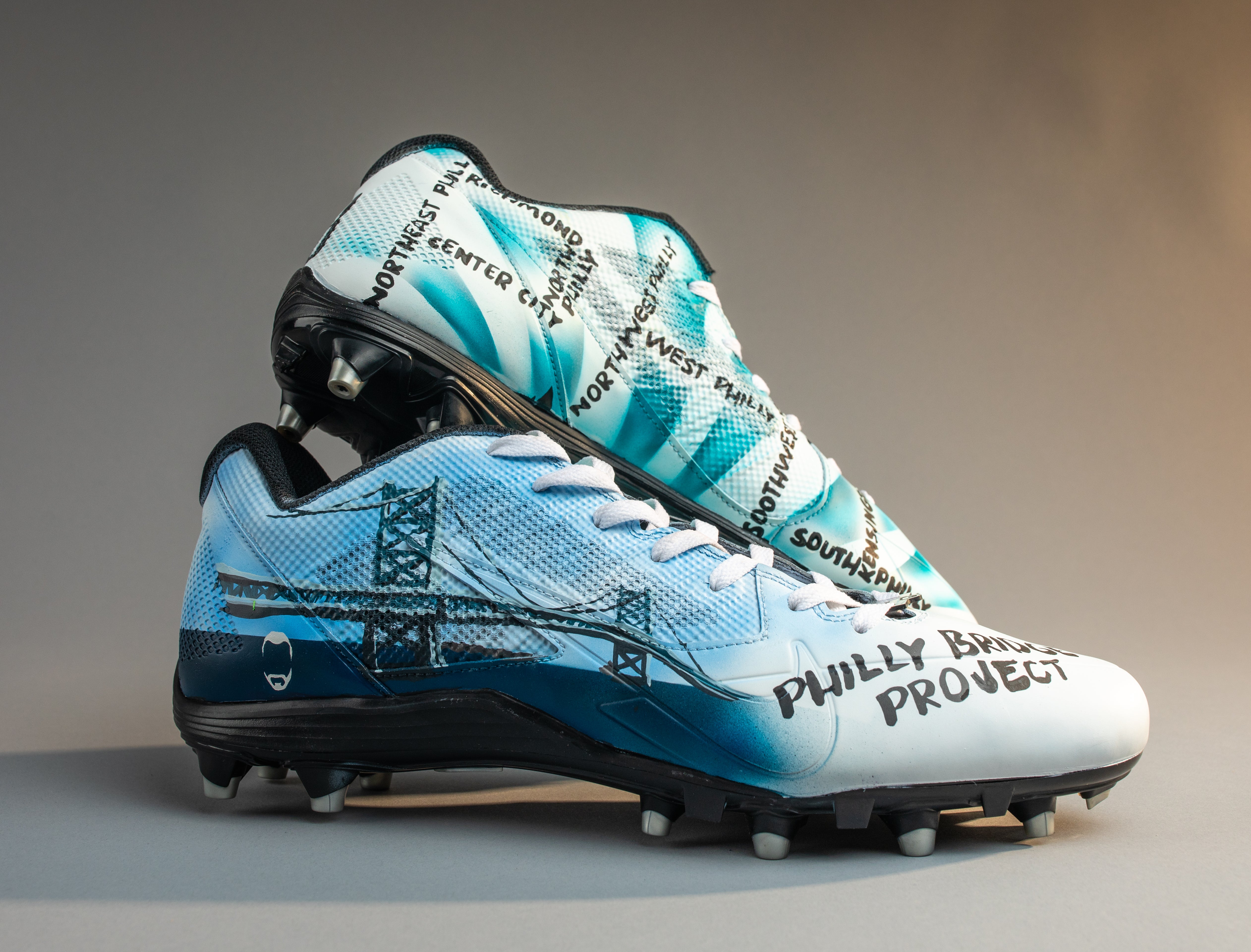 Customized cleats for Zach Ertz feature the Philly Bridge Project