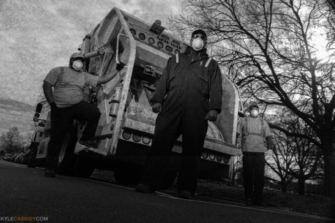 Zack, Deloy and Elijah are Philadelphia sanition workers still at work during the COVID-19 pandemic. (Kyle Cassidy)