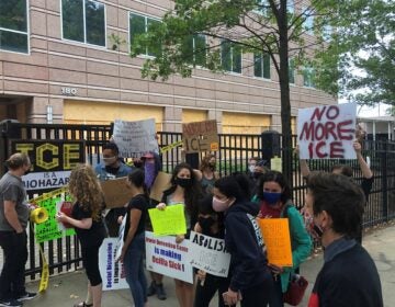 Protesters at a news conference outside ICE's Atlanta field office in September after the release of a whistleblower report about conditions at Irwin County Detention Center in Ocilla, Ga. (Jeff Amy/AP)