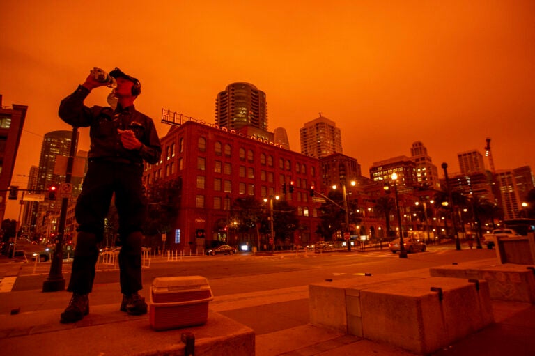 Smoky skies cast a reddish glow to San Francisco skies when the Northern California wildfires were burning earlier this year. (Ray Chavez/MediaNews Group/The Mercury News via Getty Images)