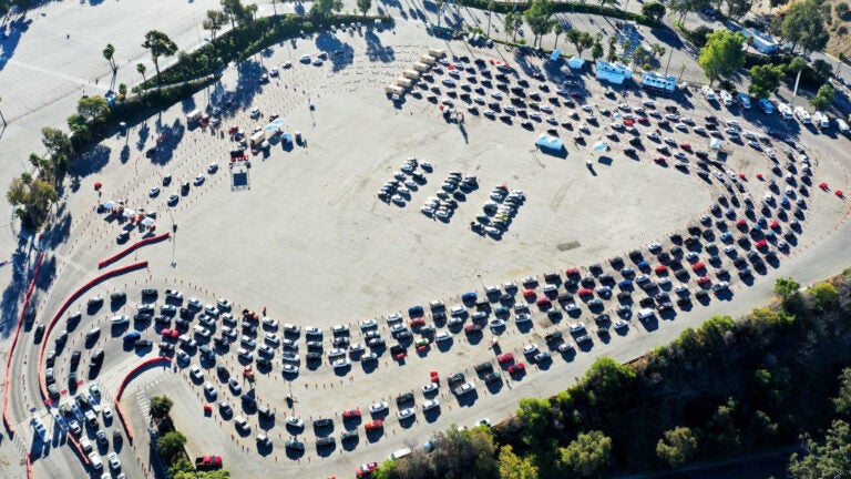 Cars are lined up at Dodger Stadium in Los Angeles for coronavirus testing