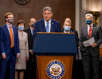 Sen. Joe Manchin (D-WV) speaks alongside a bipartisan group of Democrat and Republican members of Congress as they announce a proposal for a Covid-19 relief bill on Capitol Hill