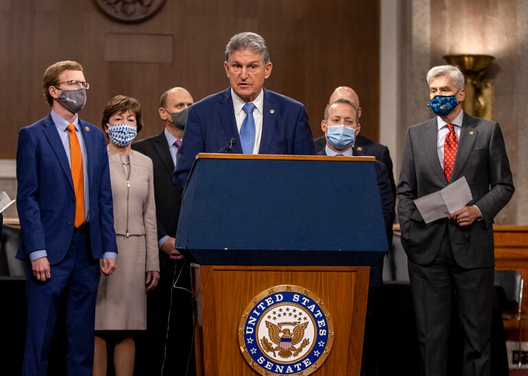 Sen. Joe Manchin (D-WV) speaks alongside a bipartisan group of Democrat and Republican members of Congress as they announce a proposal for a Covid-19 relief bill on Capitol Hill