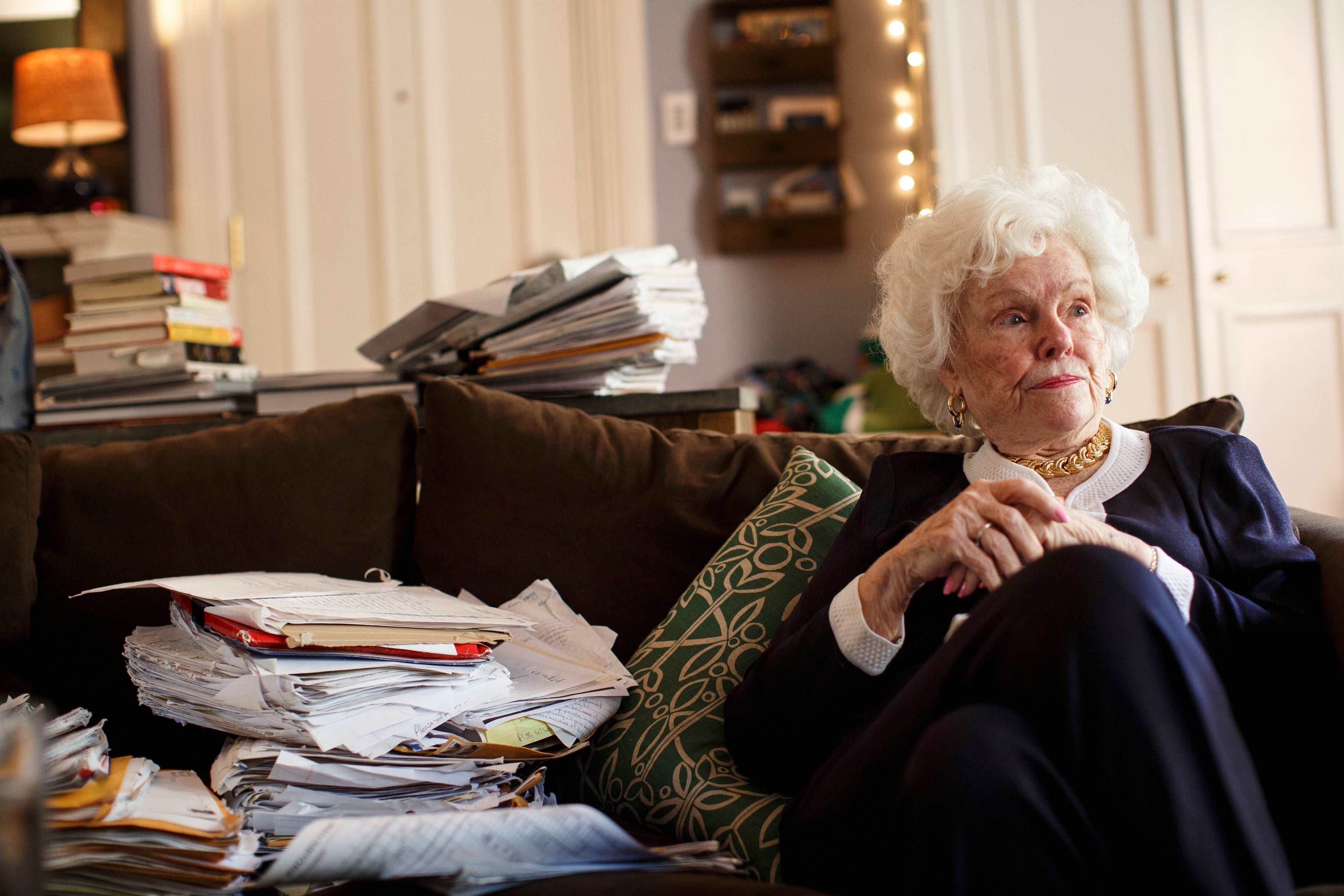 Doris Buffett, the late sister of Warren Buffett, sits with some of the letters Buffett received asking for help