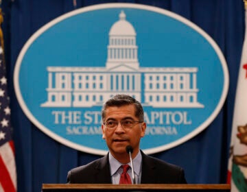 California Attorney General Xavier Becerra speaks during a press conference at the California State Capitol