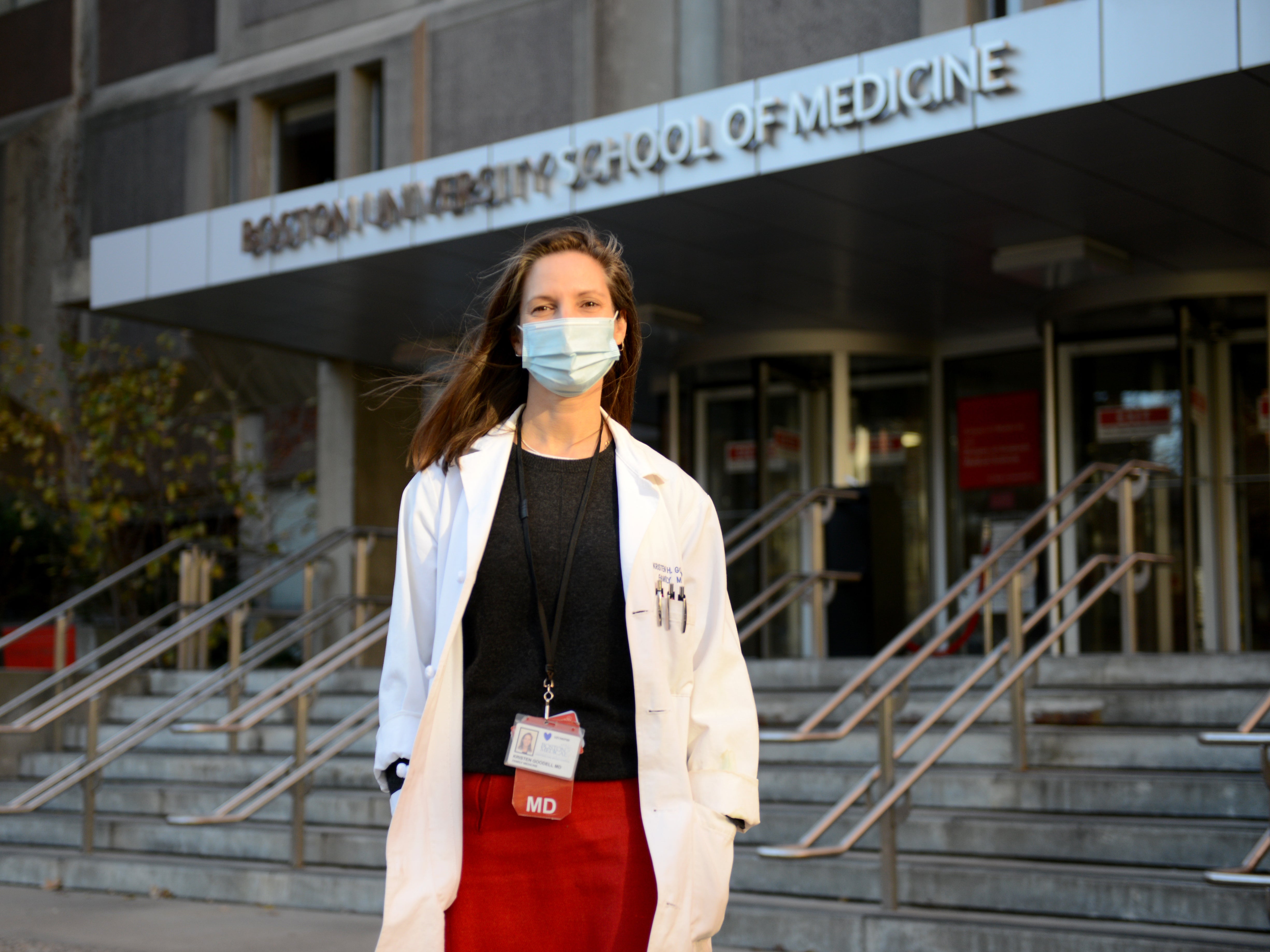 Kristen Goodell stands outside a campus building