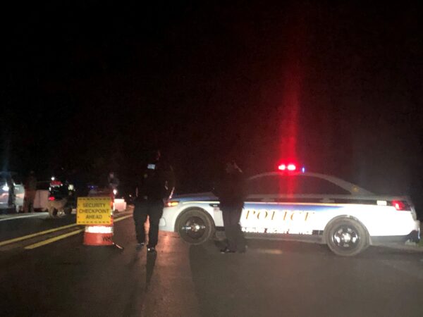 Drivers who think they can pass through Barley Mill Road at night will find their path thwarted. (Cris Barrish/WHYY)