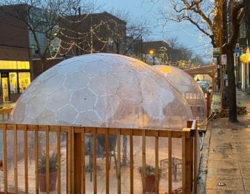 The popular Seattle restaurant San Fermo allows only two people inside each of its enclosed dining igloos at a time — to reduce the risk that people from different households will dine together. (Will Stone)