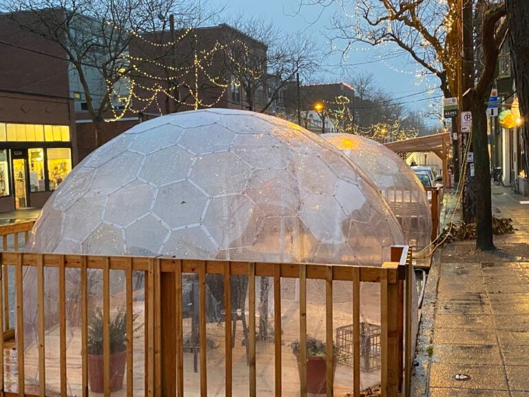 The popular Seattle restaurant San Fermo allows only two people inside each of its enclosed dining igloos at a time — to reduce the risk that people from different households will dine together. (Will Stone)