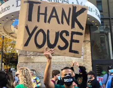 A sign at the celebration in front of Philly's vote-counting center on Saturday. (Max Marin / Billy Penn)