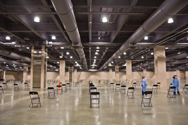 Empty chairs are seen inside the Pennsylvania Convention Center