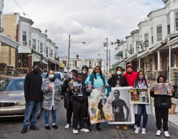 Members of the organization Voices by Choices held an event on the Simpson Street block where 7 year-old Zamar Jones was fatally shot in the summer of 2020 for those affected by gun violence on Martin Luther King Jr. Day. (Kimberly Paynter/WHYY)