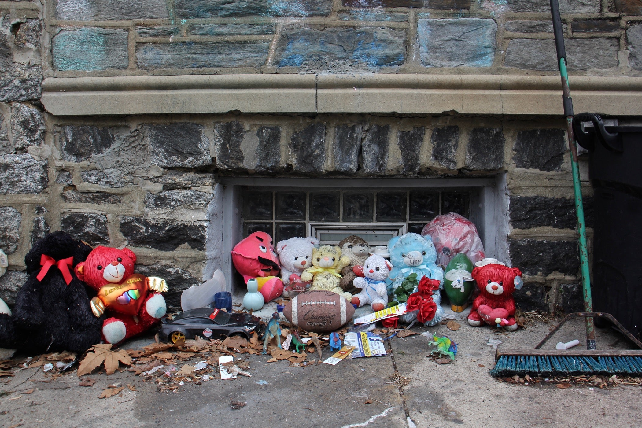 A memorial for Zamar Jones remains in front of his house on North Simpson Street