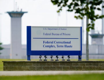 FILE - This Aug. 28, 2020, file photo shows the federal prison complex in Terre Haute, Ind.   (AP Photo/Michael Conroy, File)A federal judge said the Justice Department unlawfully rescheduled the execution of the only woman on federal death row, potentially setting up the Trump administration to schedule the execution after president-elect Joe Biden takes office. U.S. District Court Judge Randolph Moss also vacated an order from the director of the Bureau of Prisons that had set Lisa Montgomery’s execution date for Jan. 12, 2021.  (AP Photo/Michael Conroy)