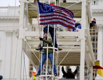 Trump supporters rally Wednesday, Jan. 6, 2021, at the Capitol in Washington. As Congress prepares to affirm President-elect Joe Biden's victory, thousands of people have gathered to show their support for President Donald Trump and his claims of election fraud. (AP Photo/Julio Cortez)