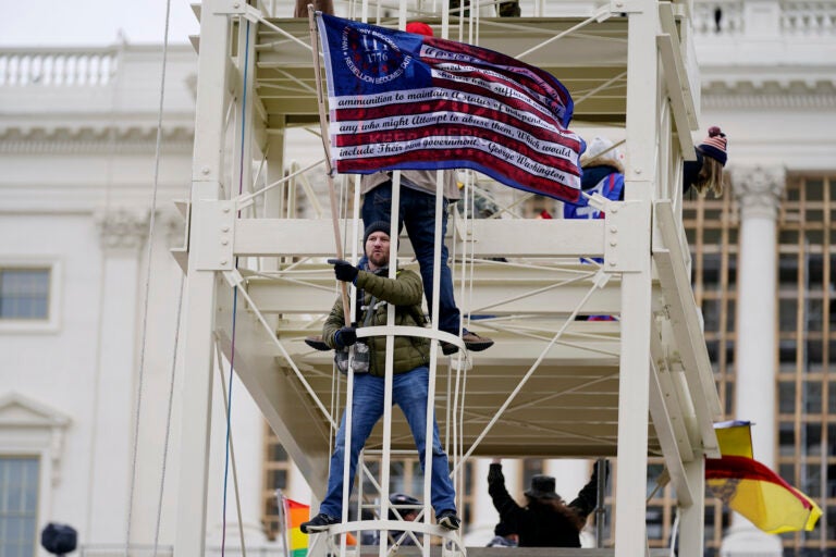 Trump supporters rally Wednesday, Jan. 6, 2021, at the Capitol in Washington. As Congress prepares to affirm President-elect Joe Biden's victory, thousands of people have gathered to show their support for President Donald Trump and his claims of election fraud. (AP Photo/Julio Cortez)