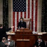 Speaker of the House Nancy Pelosi, D-Calif., leads the final vote of the impeachment of President Donald Trump, for his role in inciting an angry mob to storm the Congress last week, at the Capitol in Washington, Wednesday, Jan. 13, 2021. (AP Photo/J. Scott Applewhite)