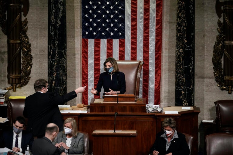 Speaker of the House Nancy Pelosi, D-Calif., leads the final vote of the impeachment of President Donald Trump, for his role in inciting an angry mob to storm the Congress