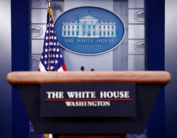 A podium in the James Brady Press Briefing Room of the White House