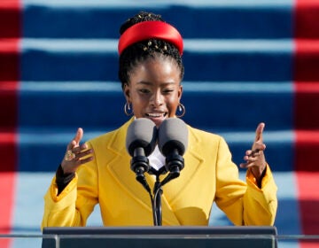 American poet Amanda Gorman reads a poem during the 59th Presidential Inauguration at the U.S. Capitol in Washington, Wednesday, Jan. 20, 2021. (AP Photo/Patrick Semansky, Pool)