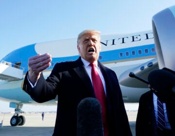 Former President Donald Trump speaks to the media before boarding Air Force One