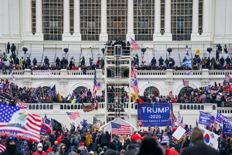 Pro-Trump insurrectionists storm the Capitol, Wednesday, Jan. 6, 2021, in Washington.