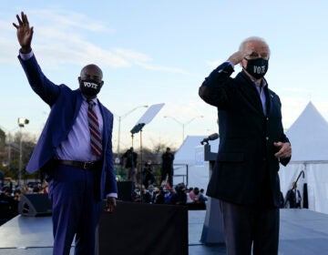 President-elect Joe Biden campaigns in Atlanta, Monday, Jan. 4, 2021, for Senate candidates Raphael Warnock, left, and Jon Ossoff