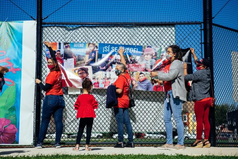 Members of CASA setting up for their event at Roberto Clemente Park in Lancaster on Saturday. (Dani Fresh/WITF)