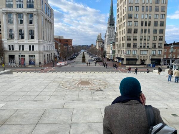 Journalists and police monitor the Pennsylvania State Capitol
