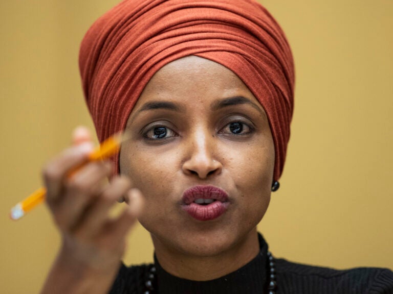 Rep. Ilhan Omar, seen here in 2019, said Wednesday that she is drafting articles of impeachment against President Trump, as pro-Trump extremists stormed the U.S. Capitol. (Manuel Balce Ceneta/AP Photo)