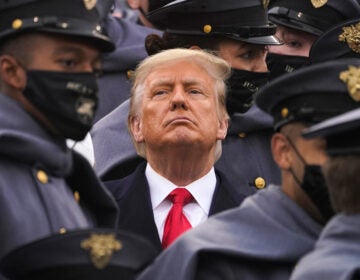 Surrounded by Army cadets, President Trump watches the Army-Navy football game