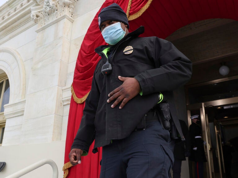 U.S. Capitol Police Officer Eugene Goodman attends a dress rehearsal for the 59th inaugural ceremony for President-elect Joe Biden and Vice President-elect Kamala Harris at the Capitol on Monday. (Jonathan Ernst/AP)