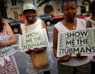 Supporters rallied outside the U.S. Treasury Department in 2019 to demand that American abolitionist Harriet Tubman's image be put on the $20 bill. (Chip Somodevilla/Getty Images)