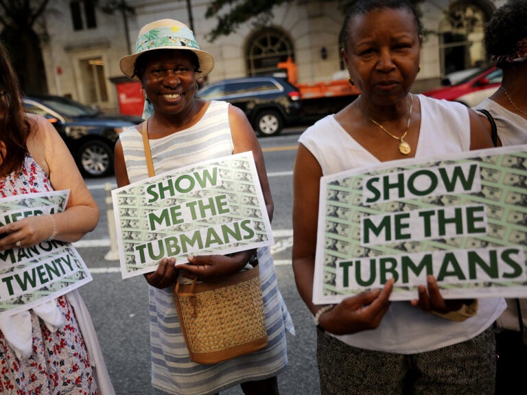 Supporters rallied outside the U.S. Treasury Department in 2019 to demand that American abolitionist Harriet Tubman's image be put on the $20 bill. (Chip Somodevilla/Getty Images)