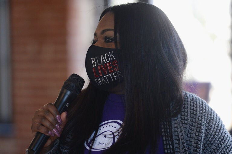 Cori Bush speaks during a canvassing event