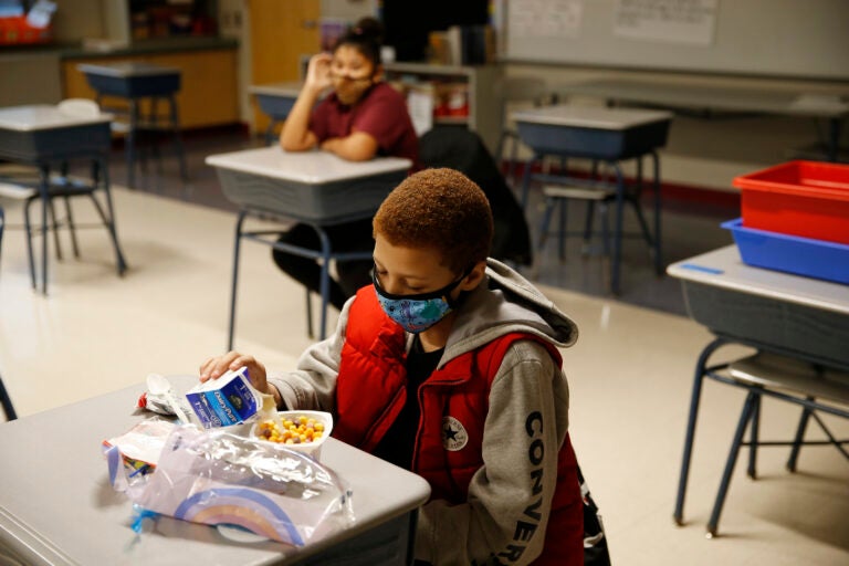 A fourth-grader eats breakfast at Mary L. Fonseca Elementary School in Fall River, Mass.