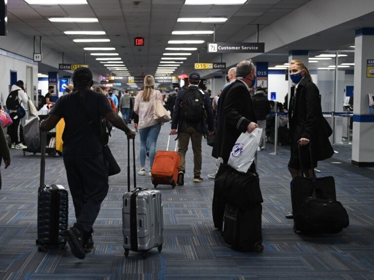 Dulles International Airport last month. The CDC will require all air passengers entering the U.S. to provide a negative COVID-19 test before boarding their flight.